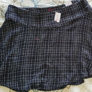 Black skirt with white stripes